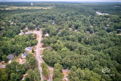 This beautiful wooded lot of approximately 0.476 acres is your on Lake Forest Yacht and Country Club in Alabama - for sale on GolfHomes.com, golf home, golf lot