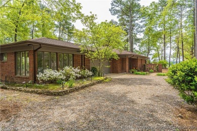 Behind the gates of Woodlake on nearly 1 acre, this on Woodlake Country Club in North Carolina - for sale on GolfHomes.com, golf home, golf lot