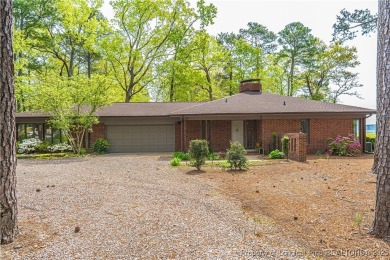 Behind the gates of Woodlake on nearly 1 acre, this on Woodlake Country Club in North Carolina - for sale on GolfHomes.com, golf home, golf lot