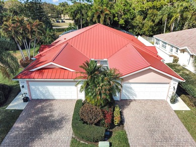 Pristine and beautifully updated, this 2-bed, 2-bath Capri model on The Florida Club in Florida - for sale on GolfHomes.com, golf home, golf lot