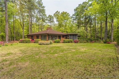 Behind the gates of Woodlake on nearly 1 acre, this on Woodlake Country Club in North Carolina - for sale on GolfHomes.com, golf home, golf lot