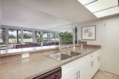 Stunning Views from this 2-Bedroom Condo with Breathtaking Golf on Boca West Golf and Country Club in Florida - for sale on GolfHomes.com, golf home, golf lot