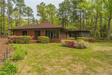 Behind the gates of Woodlake on nearly 1 acre, this on Woodlake Country Club in North Carolina - for sale on GolfHomes.com, golf home, golf lot
