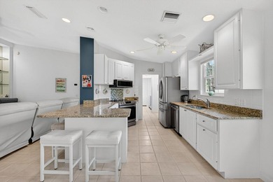 Pristine and beautifully updated, this 2-bed, 2-bath Capri model on The Florida Club in Florida - for sale on GolfHomes.com, golf home, golf lot