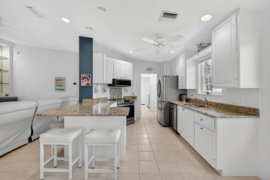 Pristine and beautifully updated, this 2-bed, 2-bath Capri model on The Florida Club in Florida - for sale on GolfHomes.com, golf home, golf lot