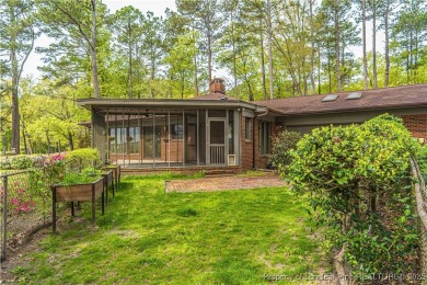 Behind the gates of Woodlake on nearly 1 acre, this on Woodlake Country Club in North Carolina - for sale on GolfHomes.com, golf home, golf lot