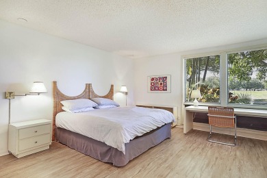 Stunning Views from this 2-Bedroom Condo with Breathtaking Golf on Boca West Golf and Country Club in Florida - for sale on GolfHomes.com, golf home, golf lot