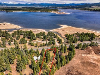 Flat, build-ready lot bordering Tamarack land with direct access on Osprey Meadows at Tamarack Resort in Idaho - for sale on GolfHomes.com, golf home, golf lot