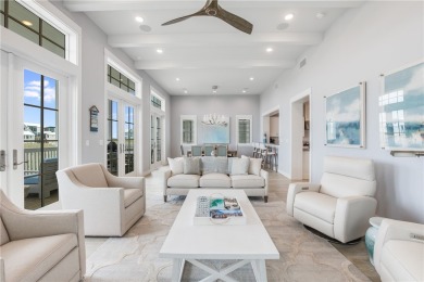 This grand three-story, 3,431 square foot beach home in on Palmilla Beach Golf Club in Texas - for sale on GolfHomes.com, golf home, golf lot