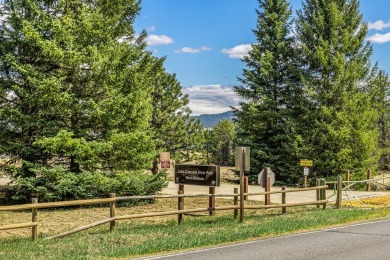 Flat, build-ready lot bordering Tamarack land with direct access on Osprey Meadows at Tamarack Resort in Idaho - for sale on GolfHomes.com, golf home, golf lot