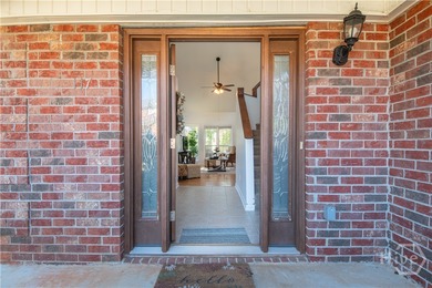 Charming and low-maintenance, this all-brick two-story home is on Jennings Mill Country Club in Georgia - for sale on GolfHomes.com, golf home, golf lot