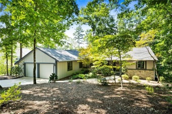 This 4 Bedroom home in a lovely wooded setting offers seasonal on  in South Carolina - for sale on GolfHomes.com, golf home, golf lot