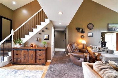 Welcome to this exceptional 4-bedroom, 2.5-bath custom home on Copper Ridge Golf Club in Michigan - for sale on GolfHomes.com, golf home, golf lot