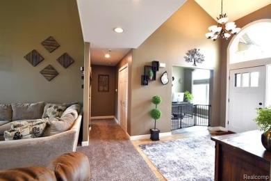 Welcome to this exceptional 4-bedroom, 2.5-bath custom home on Copper Ridge Golf Club in Michigan - for sale on GolfHomes.com, golf home, golf lot