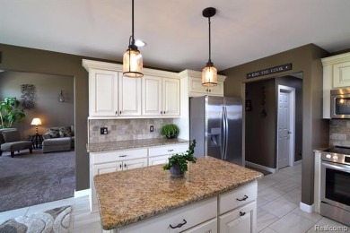 Welcome to this exceptional 4-bedroom, 2.5-bath custom home on Copper Ridge Golf Club in Michigan - for sale on GolfHomes.com, golf home, golf lot