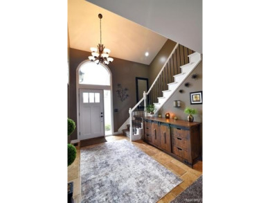 Welcome to this exceptional 4-bedroom, 2.5-bath custom home on Copper Ridge Golf Club in Michigan - for sale on GolfHomes.com, golf home, golf lot
