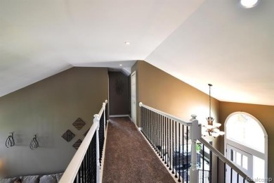 Welcome to this exceptional 4-bedroom, 2.5-bath custom home on Copper Ridge Golf Club in Michigan - for sale on GolfHomes.com, golf home, golf lot
