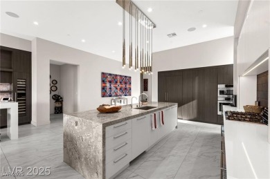 Stunning Strip and mountain views set the stage for luxury on Dragon Ridge Country Club in Nevada - for sale on GolfHomes.com, golf home, golf lot