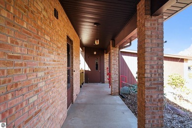 This classic brick ranch is quintessential Midland. The LaPelle on  in Michigan - for sale on GolfHomes.com, golf home, golf lot