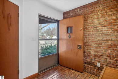 This classic brick ranch is quintessential Midland. The LaPelle on  in Michigan - for sale on GolfHomes.com, golf home, golf lot