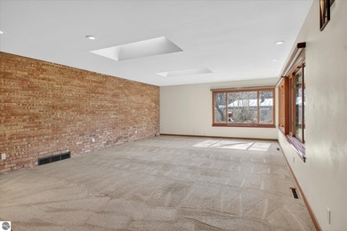 This classic brick ranch is quintessential Midland. The LaPelle on  in Michigan - for sale on GolfHomes.com, golf home, golf lot