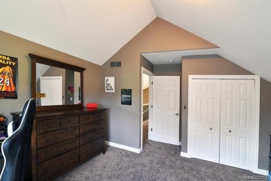 Welcome to this exceptional 4-bedroom, 2.5-bath custom home on Copper Ridge Golf Club in Michigan - for sale on GolfHomes.com, golf home, golf lot