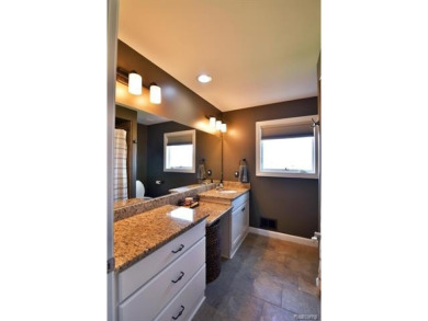 Welcome to this exceptional 4-bedroom, 2.5-bath custom home on Copper Ridge Golf Club in Michigan - for sale on GolfHomes.com, golf home, golf lot