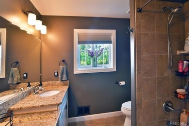Welcome to this exceptional 4-bedroom, 2.5-bath custom home on Copper Ridge Golf Club in Michigan - for sale on GolfHomes.com, golf home, golf lot