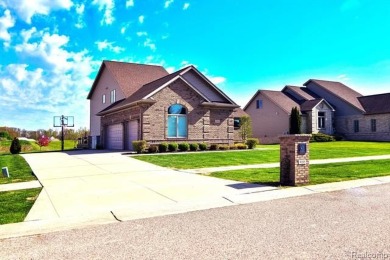 Welcome to this exceptional 4-bedroom, 2.5-bath custom home on Copper Ridge Golf Club in Michigan - for sale on GolfHomes.com, golf home, golf lot