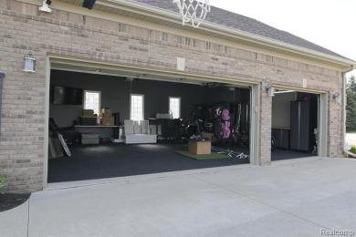 Welcome to this exceptional 4-bedroom, 2.5-bath custom home on Copper Ridge Golf Club in Michigan - for sale on GolfHomes.com, golf home, golf lot
