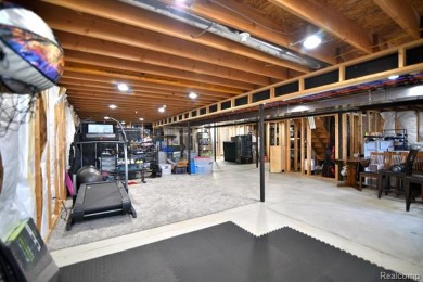 Welcome to this exceptional 4-bedroom, 2.5-bath custom home on Copper Ridge Golf Club in Michigan - for sale on GolfHomes.com, golf home, golf lot