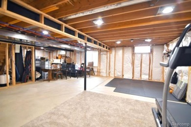 Welcome to this exceptional 4-bedroom, 2.5-bath custom home on Copper Ridge Golf Club in Michigan - for sale on GolfHomes.com, golf home, golf lot