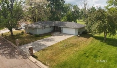 Nestled in the Country Club Estates, this charming ranch-style on Miles City Town and Country Club in Montana - for sale on GolfHomes.com, golf home, golf lot