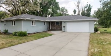 Nestled in the Country Club Estates, this charming ranch-style on Miles City Town and Country Club in Montana - for sale on GolfHomes.com, golf home, golf lot