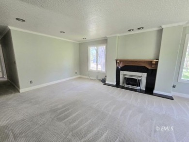 Nestled in the Country Club Estates, this charming ranch-style on Miles City Town and Country Club in Montana - for sale on GolfHomes.com, golf home, golf lot