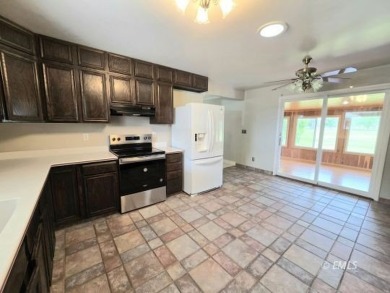 Nestled in the Country Club Estates, this charming ranch-style on Miles City Town and Country Club in Montana - for sale on GolfHomes.com, golf home, golf lot
