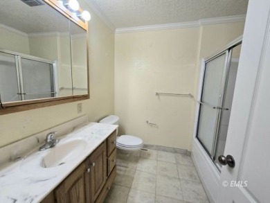 Nestled in the Country Club Estates, this charming ranch-style on Miles City Town and Country Club in Montana - for sale on GolfHomes.com, golf home, golf lot