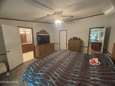 Just over an acre in Lake Tansi!! This large split floor plan on Lake Tansi Village Country Club in Tennessee - for sale on GolfHomes.com, golf home, golf lot