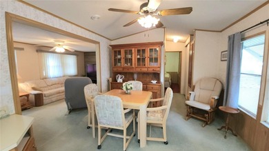 TURNKEY MOBILE HOME IN ACTIVE 55+ COMMUNITY! This one bedroom, 1 on River Run Golf Links in Florida - for sale on GolfHomes.com, golf home, golf lot
