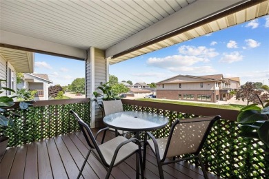 Enjoy top-floor privacy and peaceful views from this pristine on Quail Creek Golf Course in Iowa - for sale on GolfHomes.com, golf home, golf lot