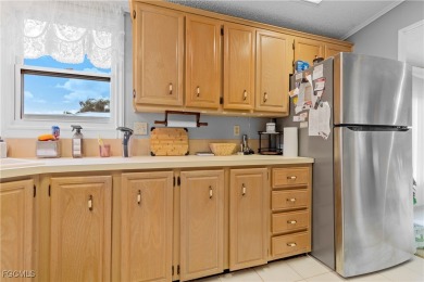 Welcome Home to Tamiami Village 55+! This well-maintained on Six Lakes Country Club in Florida - for sale on GolfHomes.com, golf home, golf lot