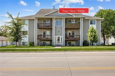 Enjoy top-floor privacy and peaceful views from this pristine on Quail Creek Golf Course in Iowa - for sale on GolfHomes.com, golf home, golf lot