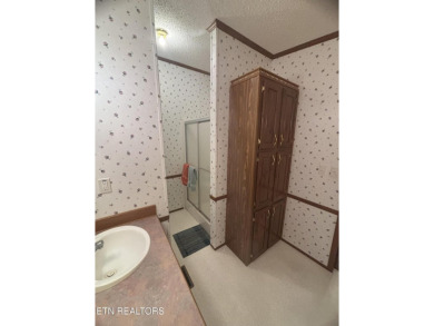 Just over an acre in Lake Tansi!! This large split floor plan on Lake Tansi Village Country Club in Tennessee - for sale on GolfHomes.com, golf home, golf lot