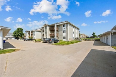 Enjoy top-floor privacy and peaceful views from this pristine on Quail Creek Golf Course in Iowa - for sale on GolfHomes.com, golf home, golf lot