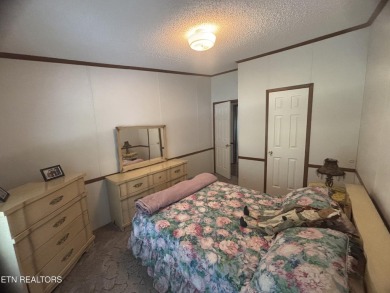Just over an acre in Lake Tansi!! This large split floor plan on Lake Tansi Village Country Club in Tennessee - for sale on GolfHomes.com, golf home, golf lot