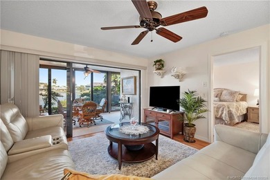 This spectacular furnished turnkey first-floor 2BR/2BA residence on Miles Grant Country Club in Florida - for sale on GolfHomes.com, golf home, golf lot