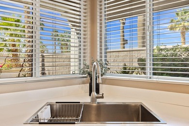 Can you imagine living just steps to a fabulous saltwater pool on Mountain Vista Golf Course At Sun City Palm Desert in California - for sale on GolfHomes.com, golf home, golf lot