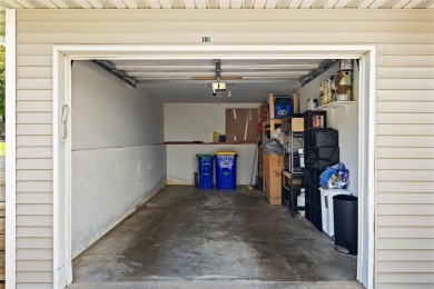 Enjoy top-floor privacy and peaceful views from this pristine on Quail Creek Golf Course in Iowa - for sale on GolfHomes.com, golf home, golf lot