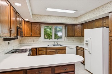Estate Sale. Full size wooded homesite with golf views behind on Dolphin Head Golf Club in South Carolina - for sale on GolfHomes.com, golf home, golf lot