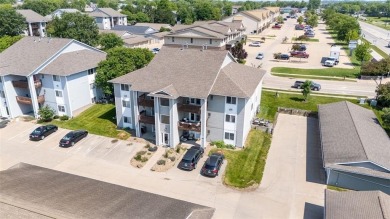 Enjoy top-floor privacy and peaceful views from this pristine on Quail Creek Golf Course in Iowa - for sale on GolfHomes.com, golf home, golf lot